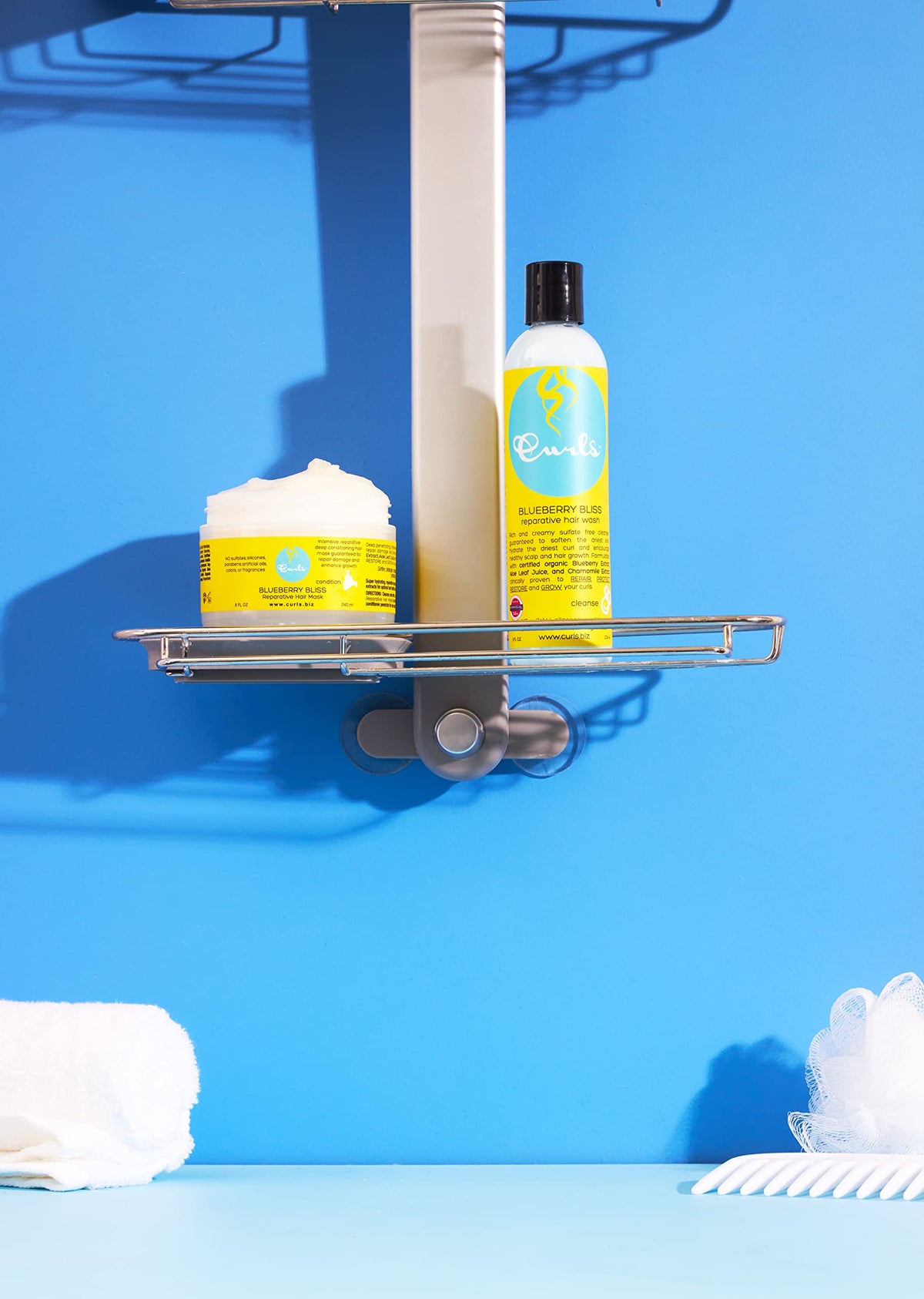 Curls being applied to damp curls to improve detangling and softness