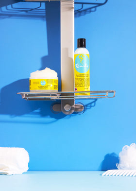 Curls being applied to damp curls to improve detangling and softness
