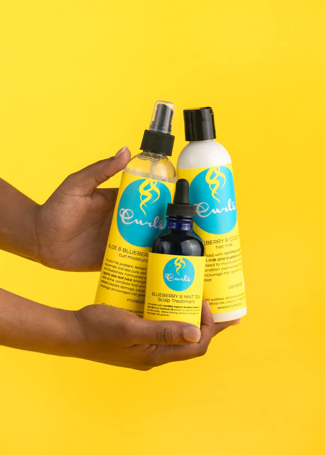Curls Blueberry Bliss next to ruler showing 8 fl oz size and portability
