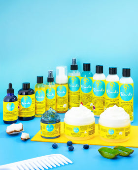 Curls jar held in hand to show 8 fl oz scale and travel-friendly size