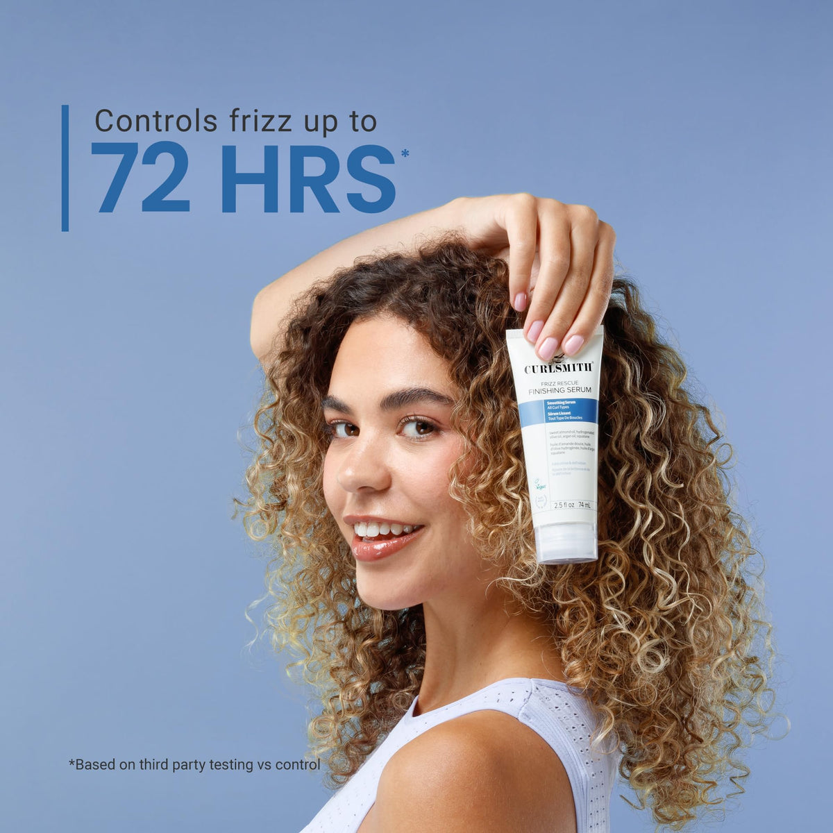 CURLSMITH serum warmed in hand before application to reduce frizz and add shine