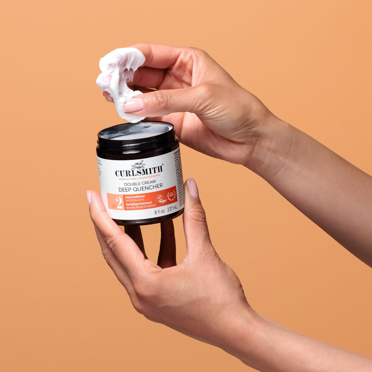 CURLSMITH label close-up showing vegan and cruelty-free benefits on packaging
