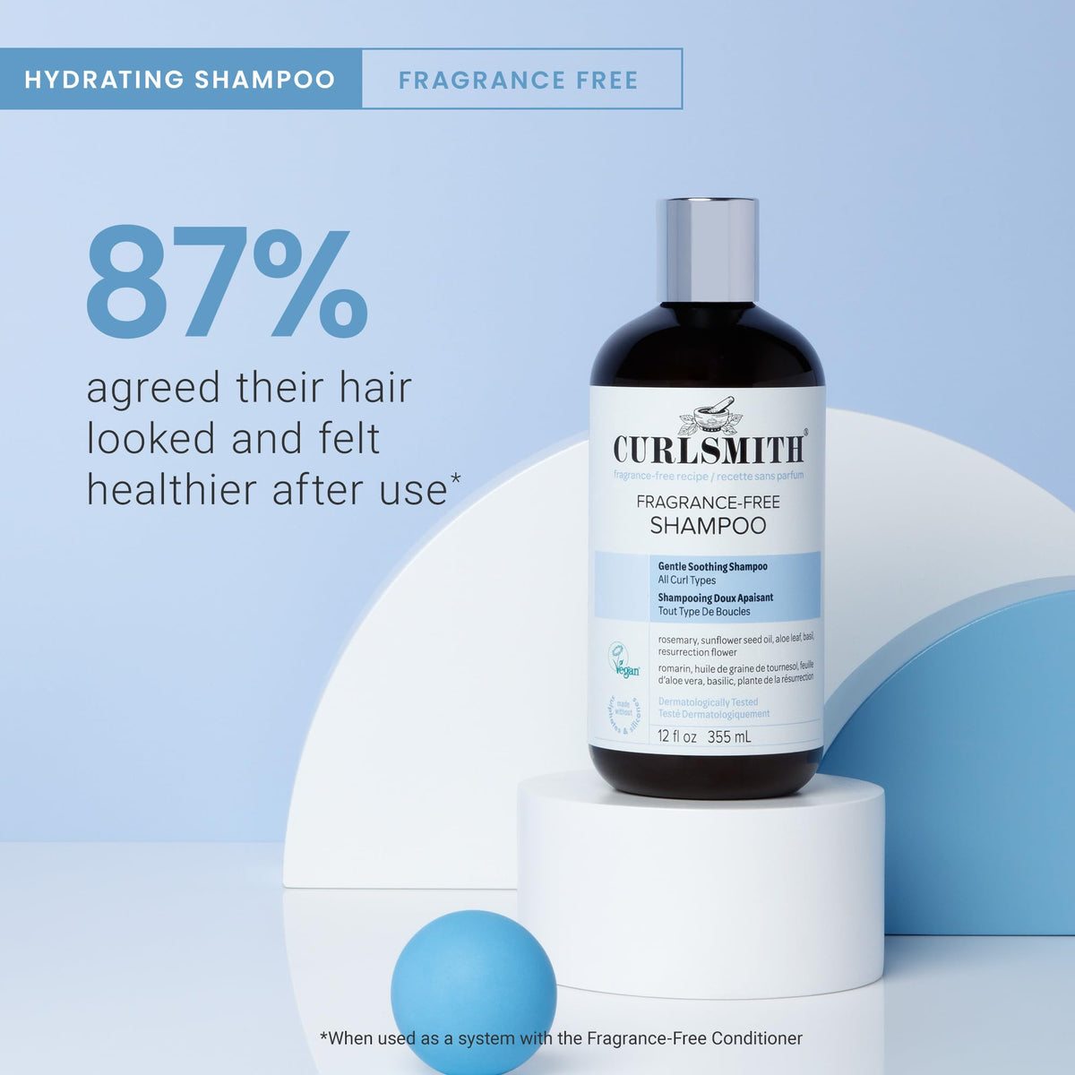 CURLSMITH shampoo in hand being applied to wet hair for easy cleansing