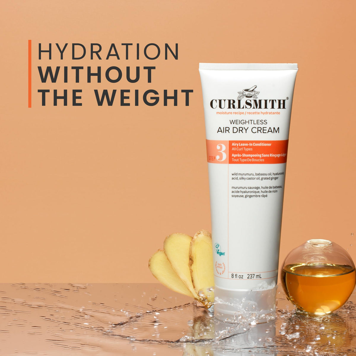 CURLSMITH applied to damp curls demonstrating detangling and hydration benefit