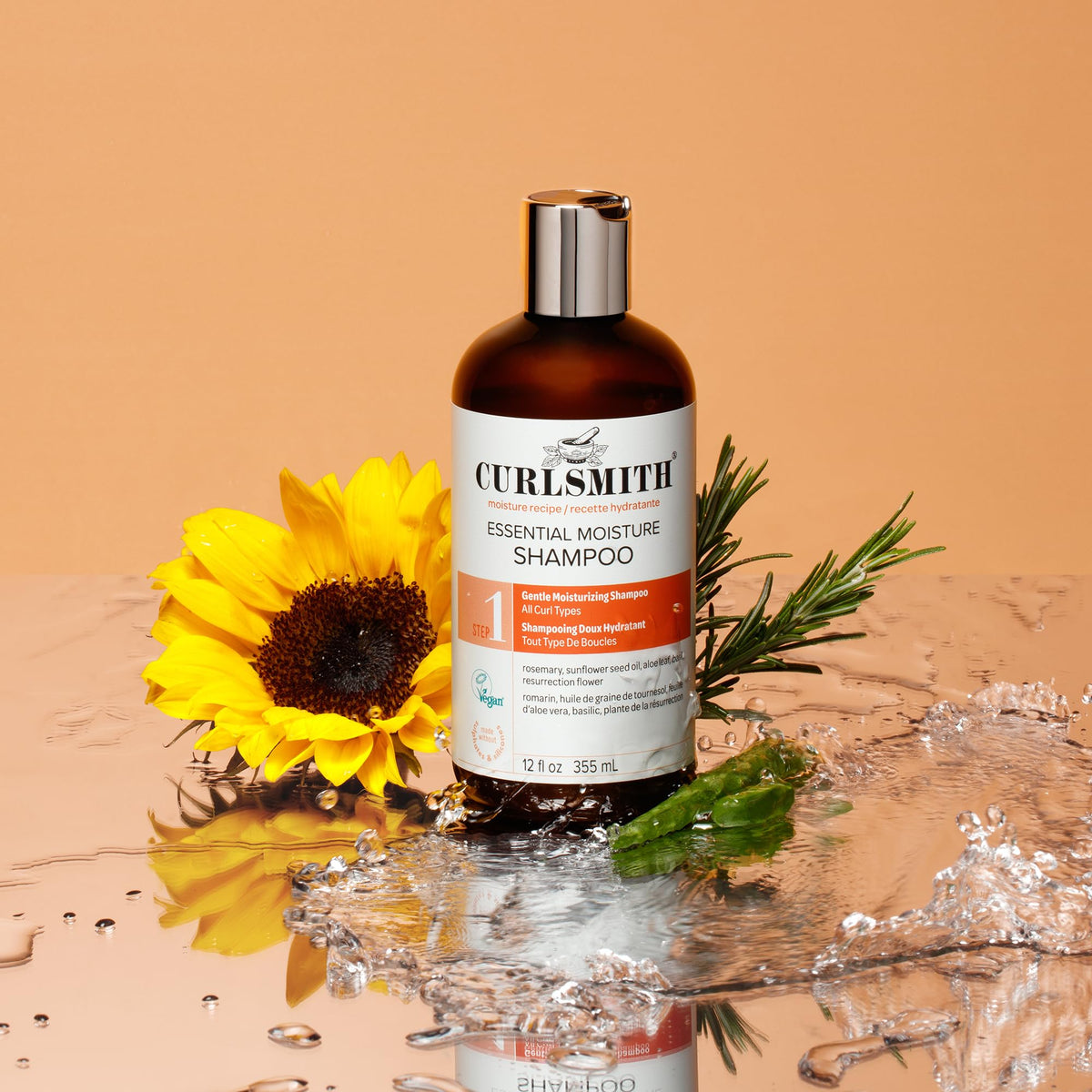 CURLSMITH applied to wet curls showing improved definition benefit