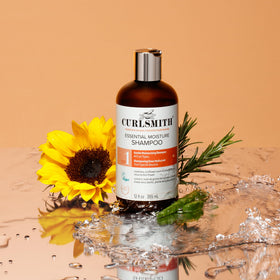 CURLSMITH applied to wet curls showing improved definition benefit