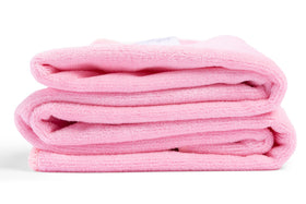 Curly Girl towel wrapped on model demonstrating frizz control