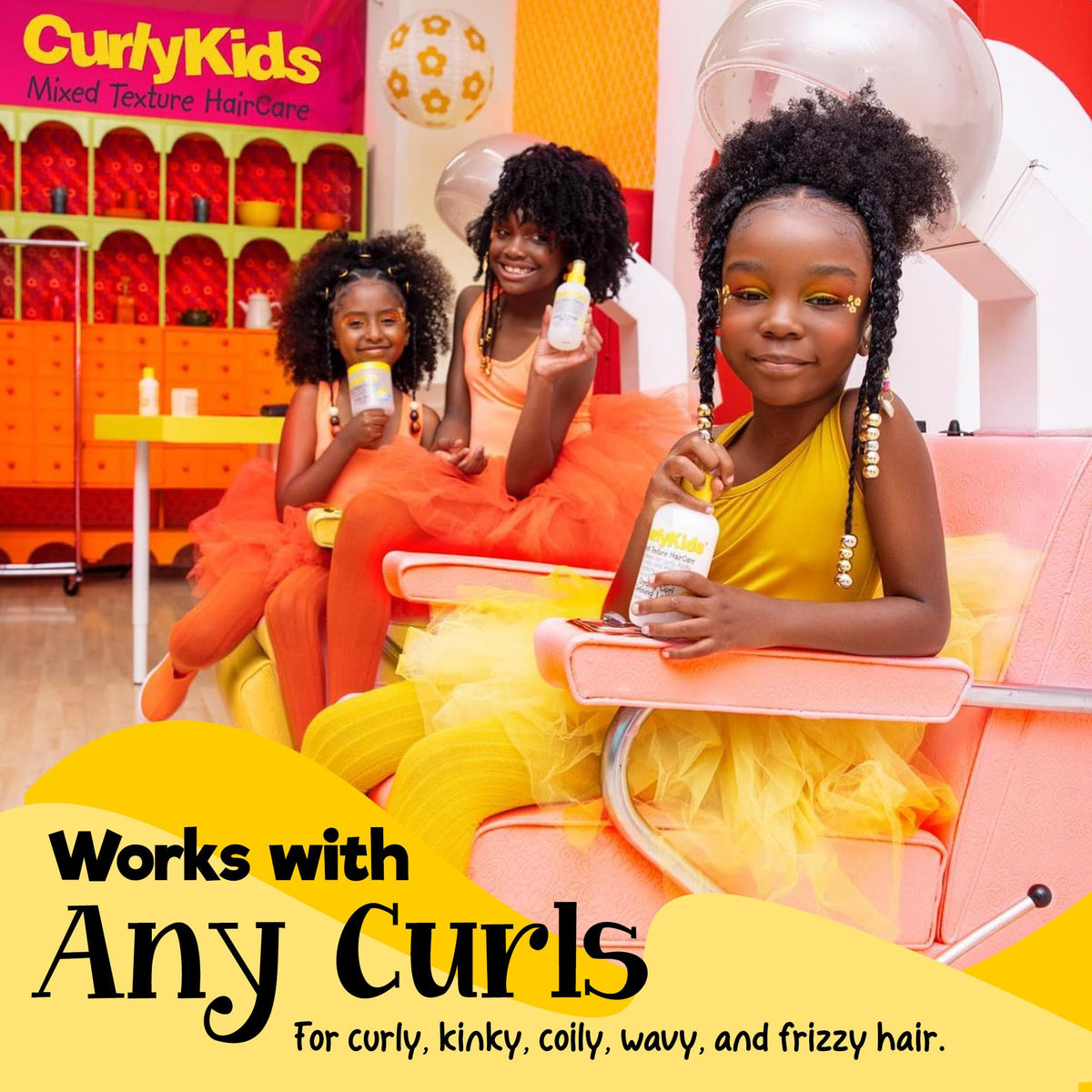 CurlyKids conditioner cream in hand showing rich detangling moisture