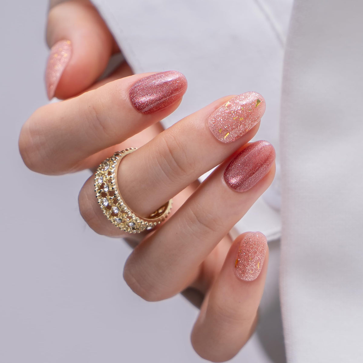 CurvLife nails being pressed onto natural nails demonstrating quick application