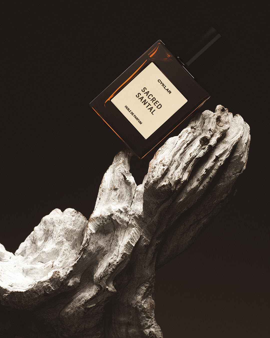 CYKLAR Sacred Santal oil texture close-up highlighting smooth formula that melds with skin