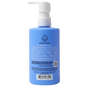Dabble & Dollop bottle held in hand to show 10 fl oz size