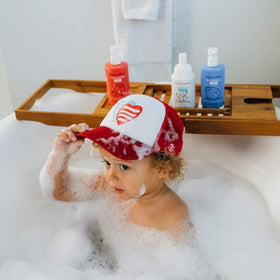 Dabble & Dollop blueberry whipped foam pump producing airy foam for playful baths