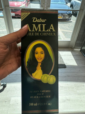 Dabur bottle cap detail highlighting controlled pour for mess-free use
