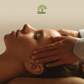 Dabur mustard oil in massage setting illustrating relaxation and skin nourishment