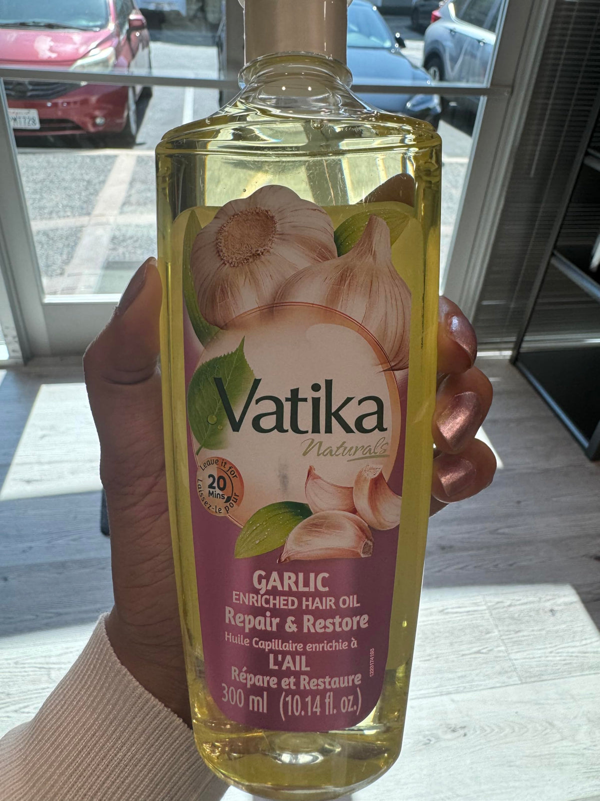 Side label of Dabur Vatika 200ml bottle highlighting usage instructions and benefits