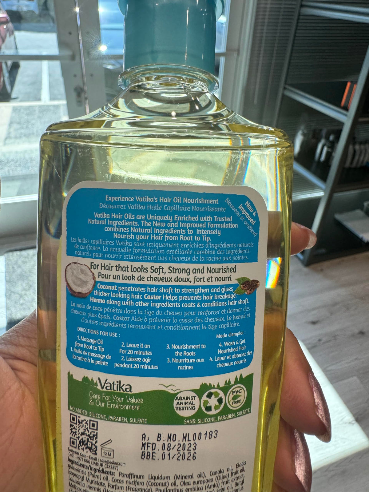 Dabur Vatika oil texture closeup showing smooth coconut-rich texture for deep nourishment