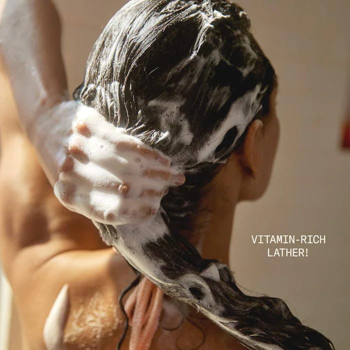 DAE shampoo in shower scene, demonstrates real-world cleansing routine