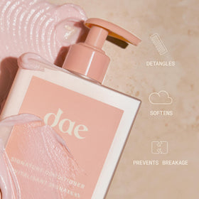 DAE shampoo poured into palm illustrating easy application and foam