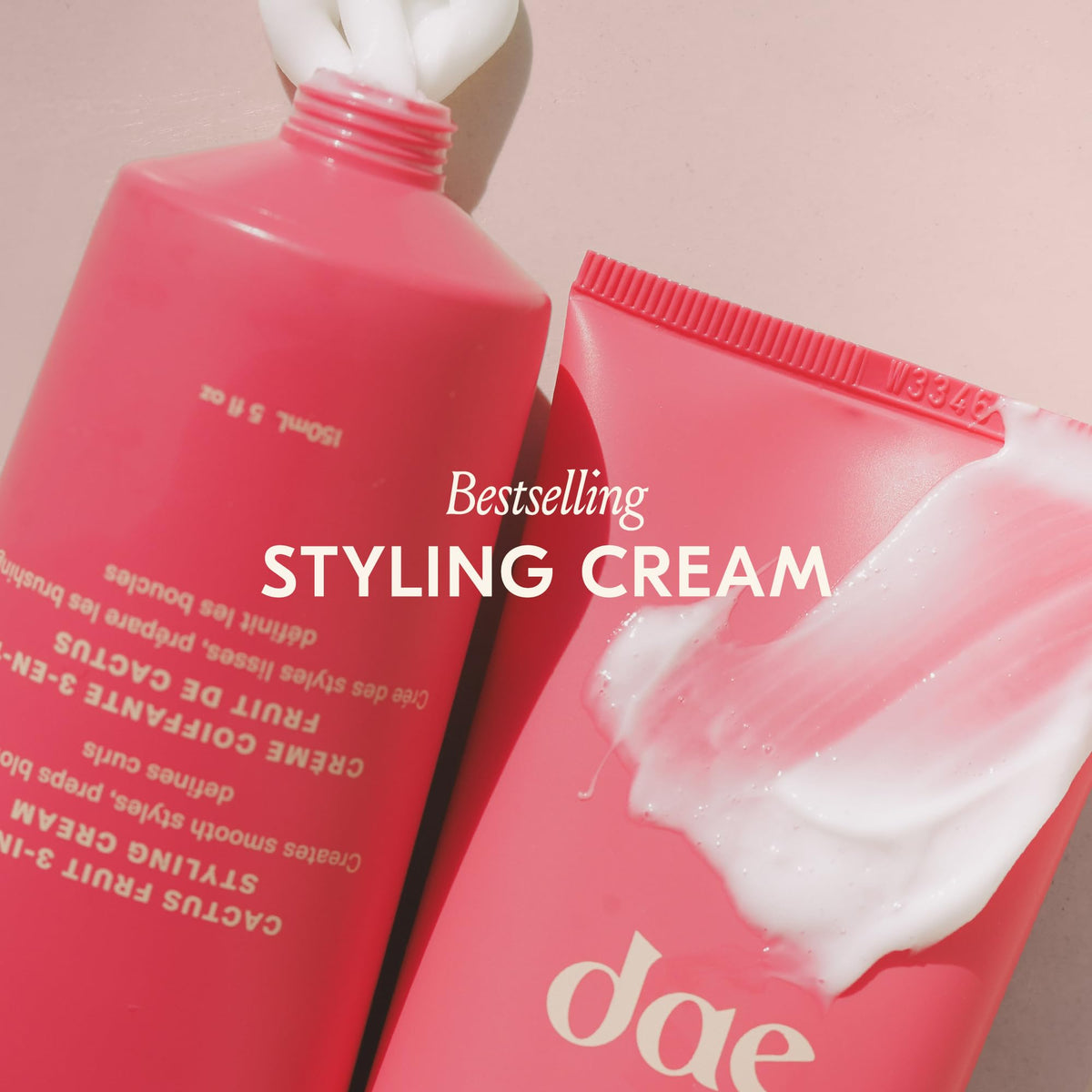 DAE applying cream to damp hair to prep for smoother blowout