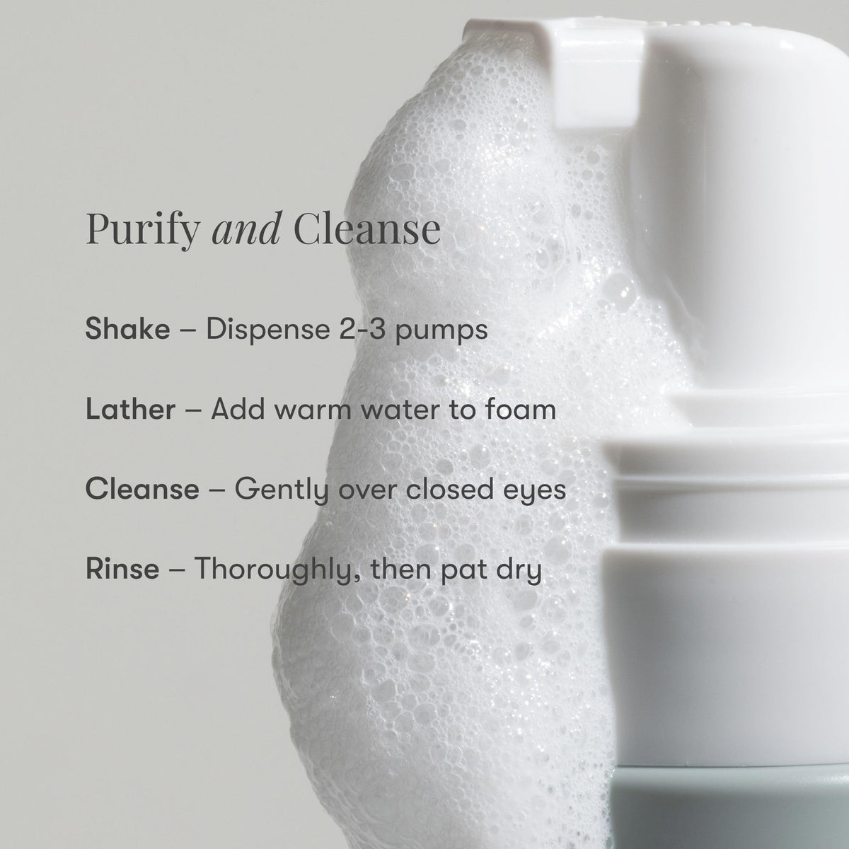 Daily Practice Dr. B foam texture on fingertip displaying gentle, airy lather