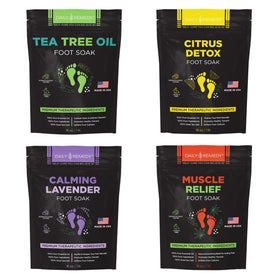 daily remedy front packaging showing all four foot soak jars and benefits