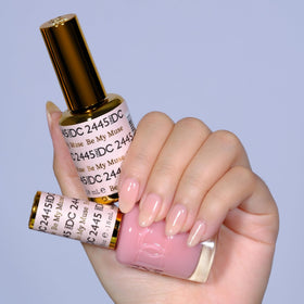 DAISY DND close-up of brush and sheer pigment enabling precise, smooth application