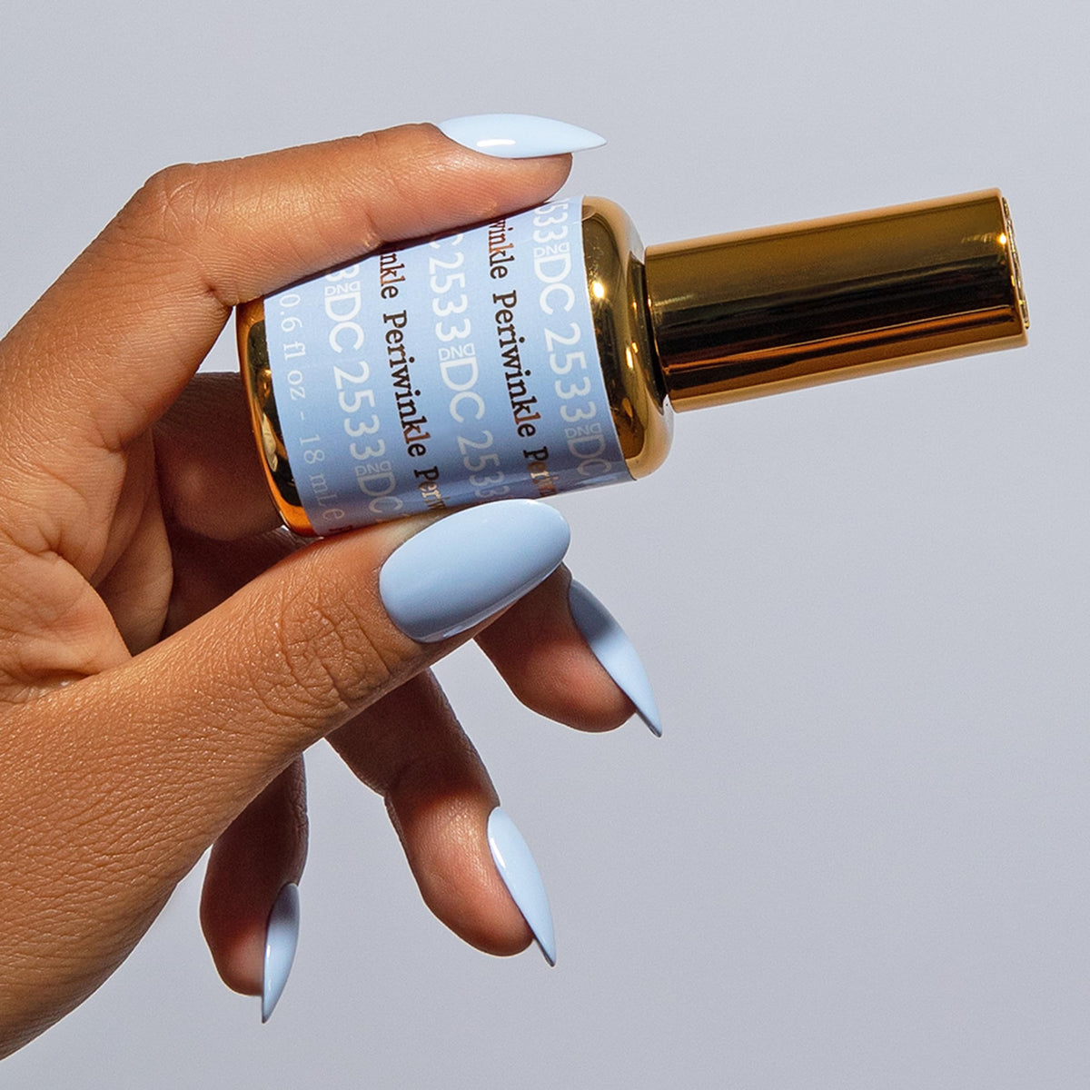 DAISY DND gel bottle close-up showing brush and smooth gel finish