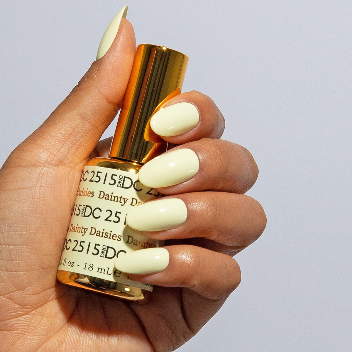 DAISY DND open bottles close-up highlighting matching Dainty Daisies shade and texture