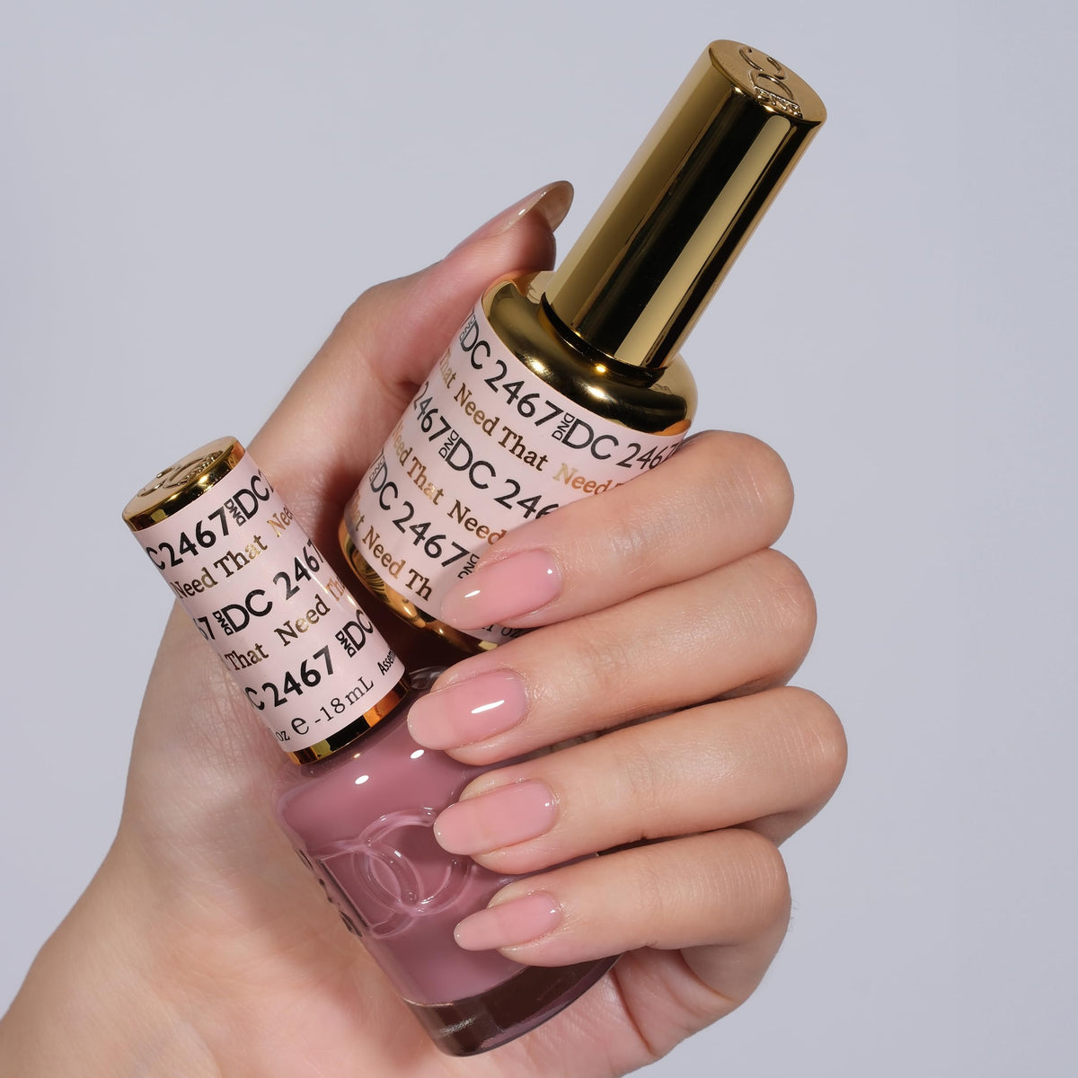 DAISY DND open bottles with brushes demonstrating easy application