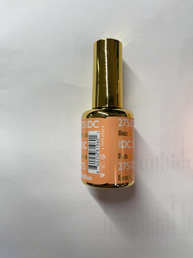 DAISY DND manicure in lifestyle scene pairing orange nails with summer style