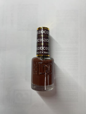 DAISY DND salon scene with technician applying Walnut Brown duo