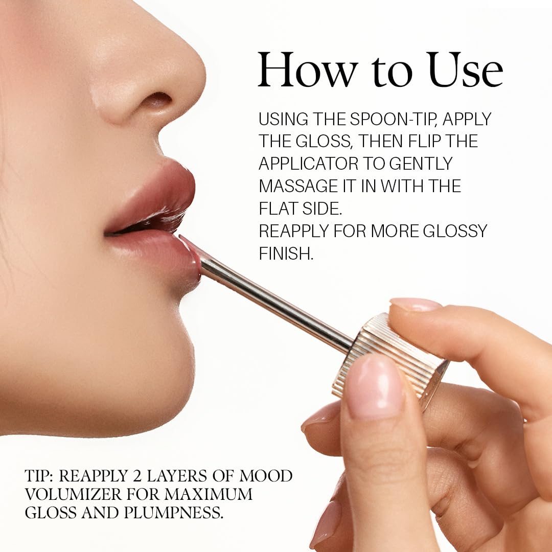 d'alba Piedmont gloss placed in purse with essentials for convenience and on-the-go hydration