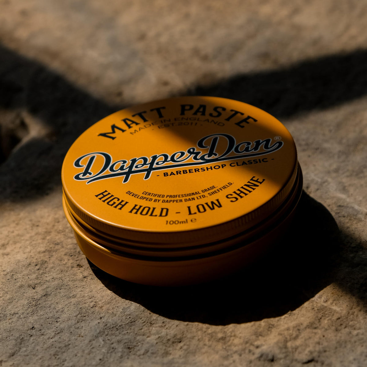 Dapper Dan lifestyle styled hair on model, shows natural matte finish benefit