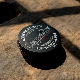Dapper Dan pomade texture close-up displaying rich consistency for strong hold