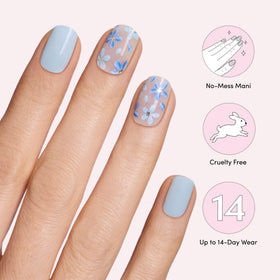 Dashing Diva scale comparison on finger showing accurate size fit