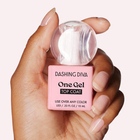 Dashing Diva bottle held in hand to show size and travel-friendly convenience