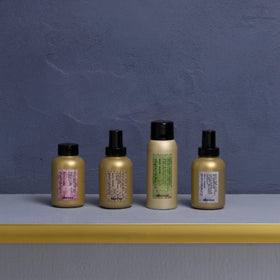 Davines serum used while diffusing curly hair to enhance bounce