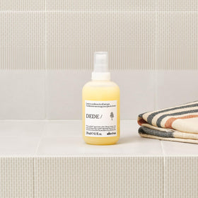 Davines DEDE being applied to hair to smooth and detangle