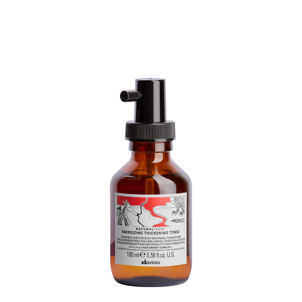 Davines bottle front packaging showing product and travel size benefit