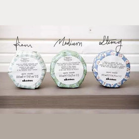 Davines forming pomade label close-up highlighting brand details and usage directions for clarity