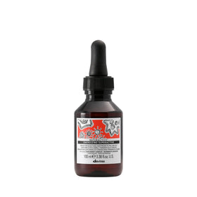 Davines bottle front packaging showing brand and travel size benefit