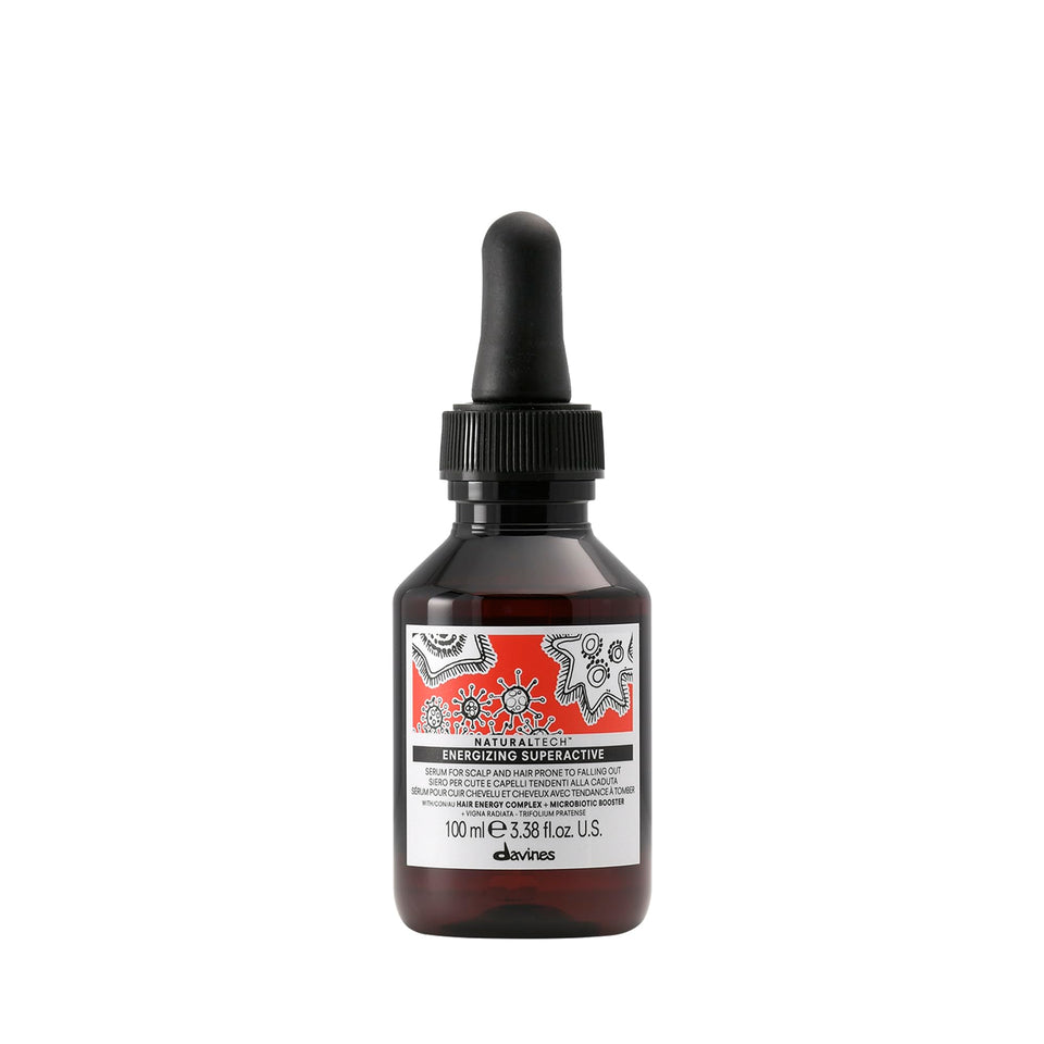 Davines bottle front packaging showing brand and travel size benefit