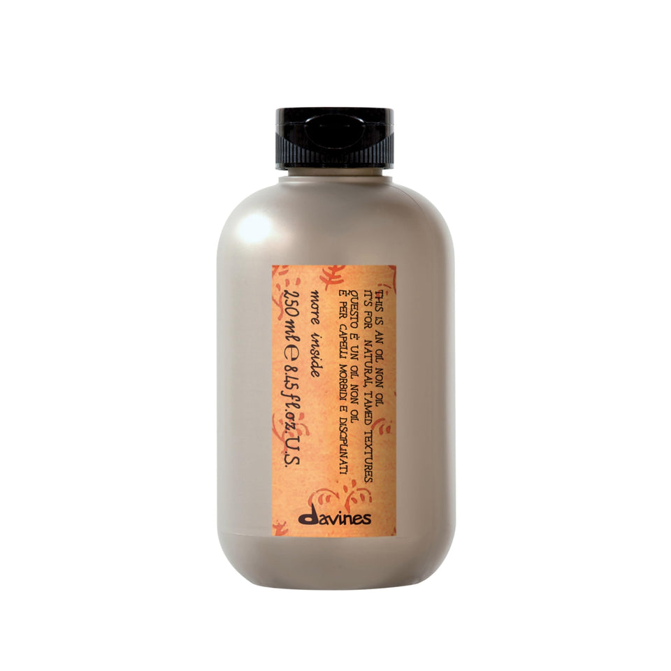 davines front packaging of This Is An Oil Non Oil showing sleek bottle and brand benefit
