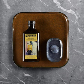 Davines hair wash in hand showing how little product is needed