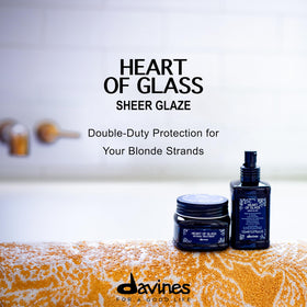 Davines applied to damp blonde hair providing heat protection benefit