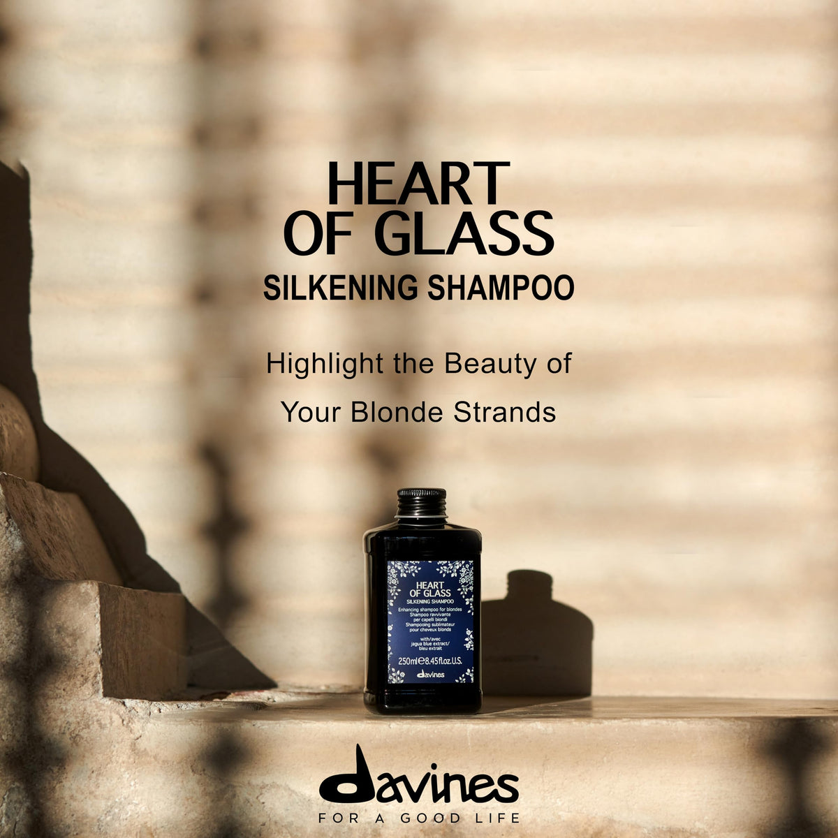 Davines blue shampoo foaming in hand demonstrating gentle cleansing power