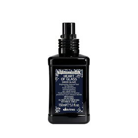 Davines bottle front packaging showing product and benefit of brightening