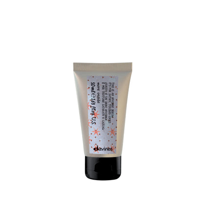 Davines front packaging showing travel-size serum and clean design benefit