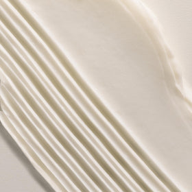 Davines LOVE Curl Conditioner texture close-up showing creamy slip for detangling