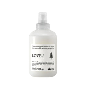 Davines bottle front packaging showing product benefits and size